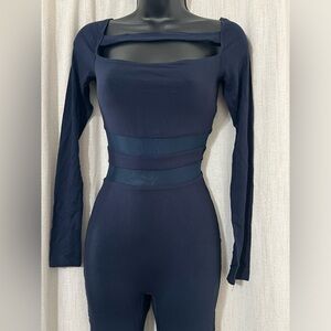 Naked Wardrobe Long Sleeve Cutout Waist Jumpsuit